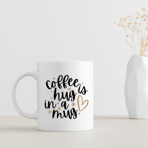 Love and Hugs Coffee Cup on a clean table with cozy minimal decor